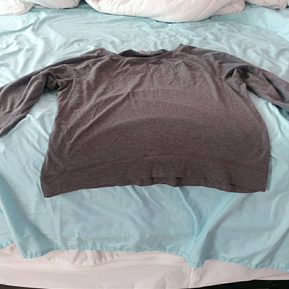A shirt with elbow length sleeves